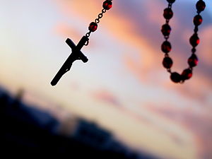 A rosary crucifix.