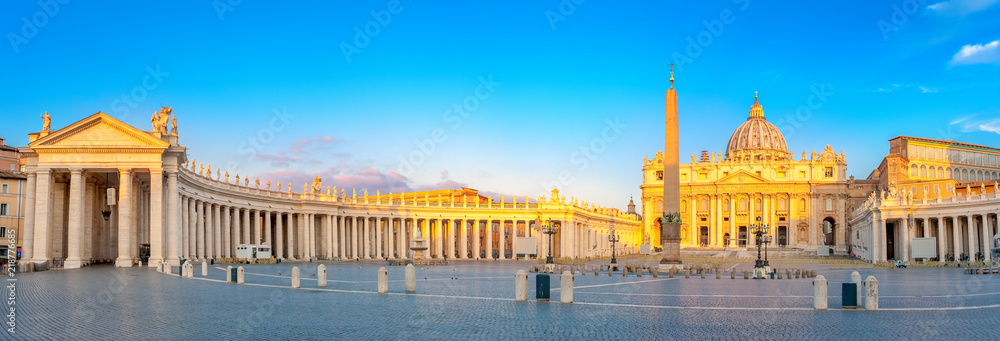 Panorama of St. Peter's Square illuminated by the first rays of the morning sun, the Vatican. Italy
